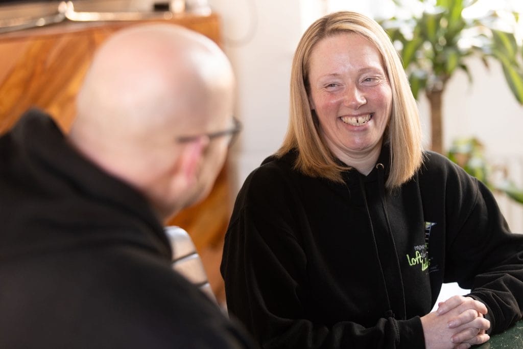 More Than Loft Ladders female franchisee in discussion during franchise discovery meeting